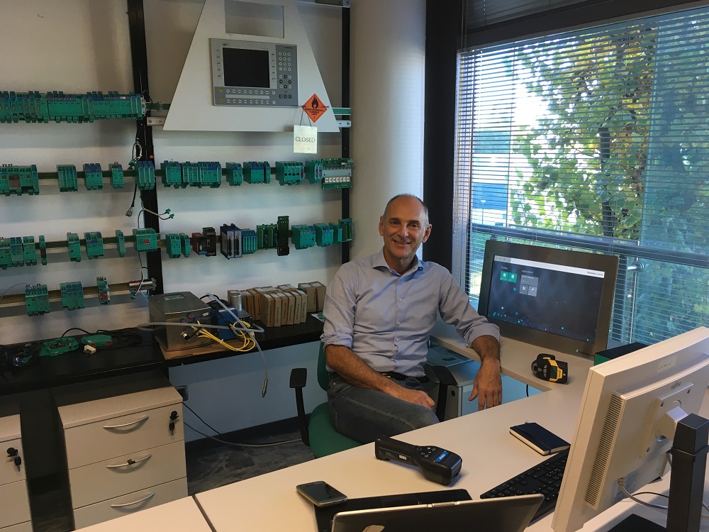 Giovanni, Global Technical Support Manager, in his office